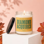 Scented candle with "Achievement Unlocked Diamond Acquired" text, no refunds, no returns, Vowed.