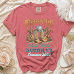 T-shirt with "Reckless in Texas, Olivia's Bach, Austin, TX Summer 2026" and boots.