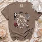 Brown t-shirt with "This Bride Bites" text, vampire fangs, and bridal graphics.