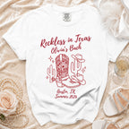 White t-shirt with "Reckless in Texas Olivia's Bach Austin, TX Summer 2026" in red.