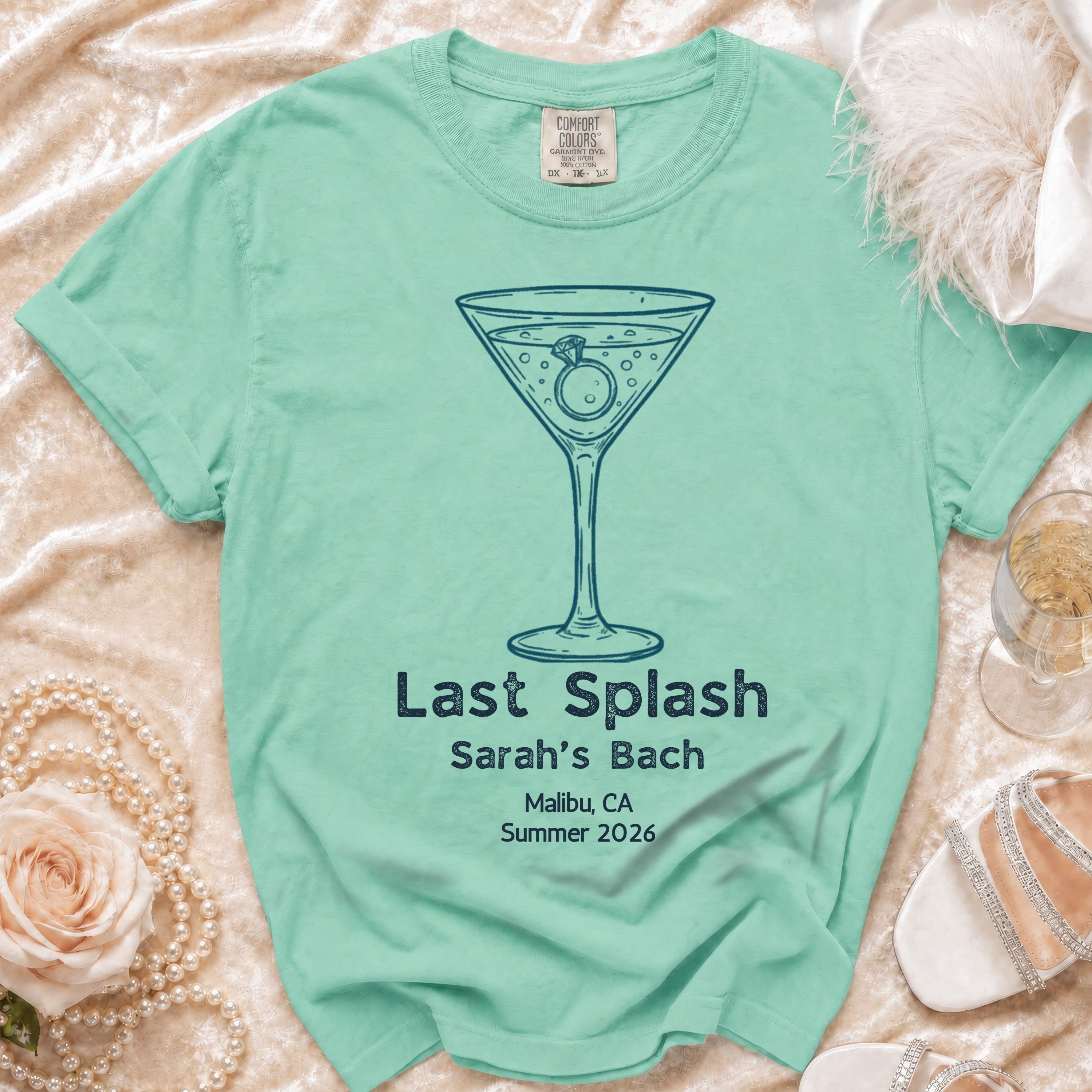 T-shirt with "Last Splash Sarah's Bach Malibu, CA Summer 2026" text.