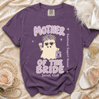 Purple t-shirt with "Mother of the Bride Social Club" and a ghost graphic.