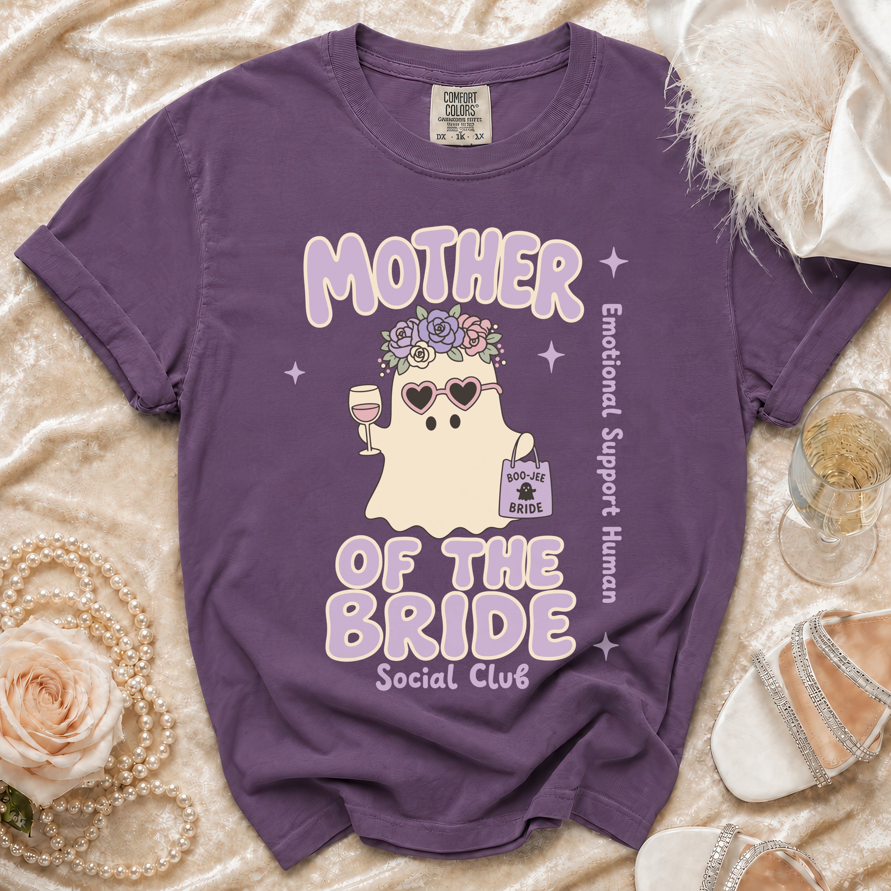 Purple t-shirt with "Mother of the Bride Social Club" and a ghost graphic.