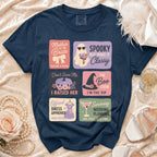 Navy t-shirt with six Halloween-themed wedding squares: Mother of the Bride, Spooky but Make It Classy, Don't Scare Me I Raised Her, The Boo Crew I'm the VIP, Official Dress Approver Mob Duties, Surviving Wedding Planning One Spell at a Time.