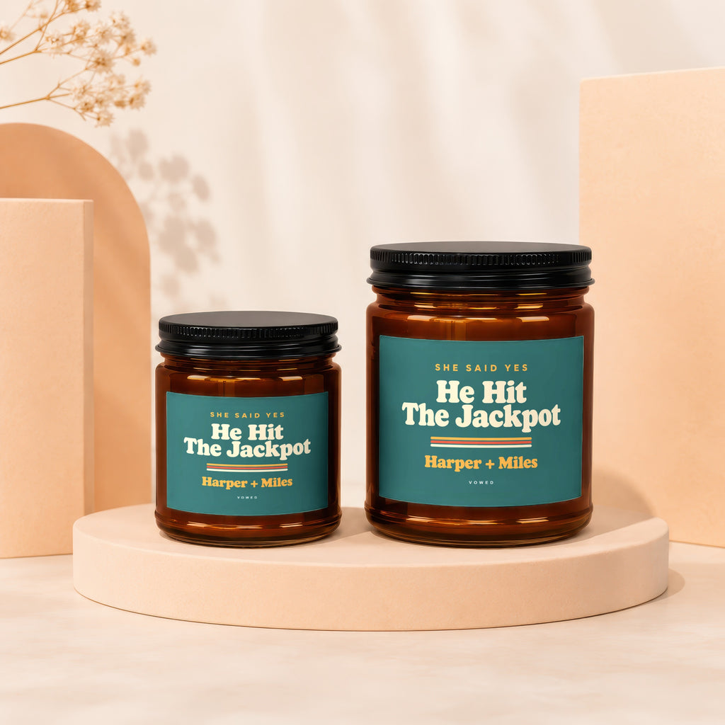 Two amber jars with teal labels reading "He Hit The Jackpot Harper + Miles".