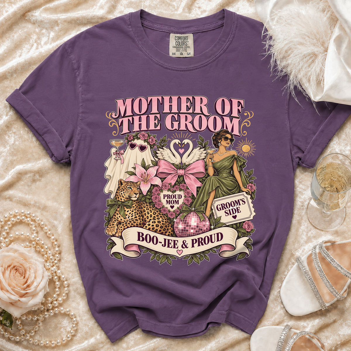 Purple t-shirt with "Mother of the Groom" graphic, featuring a leopard, swans, and "Boo-Jee & Proud."