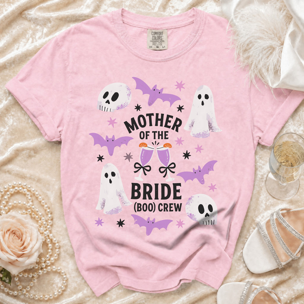Pink t-shirt with "Mother of the Bride (Boo) Crew" graphic and spooky graphics.