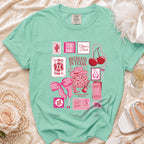 Mint t-shirt with "Reckless in Texas" and Olivia's Bach Austin Disco Cowgirl graphics.