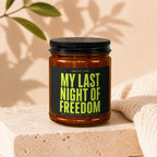 Scented candle with black lid reading "My Last Night of Freedom."