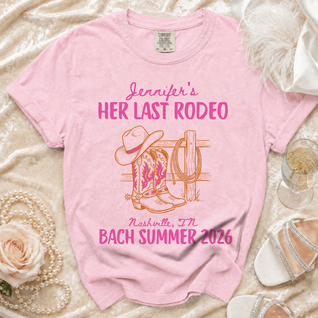 Pink t-shirt with "Jennifer's HER LAST RODEO Nashville, IN BACH SUMMER 2026" text and cowboy boots.