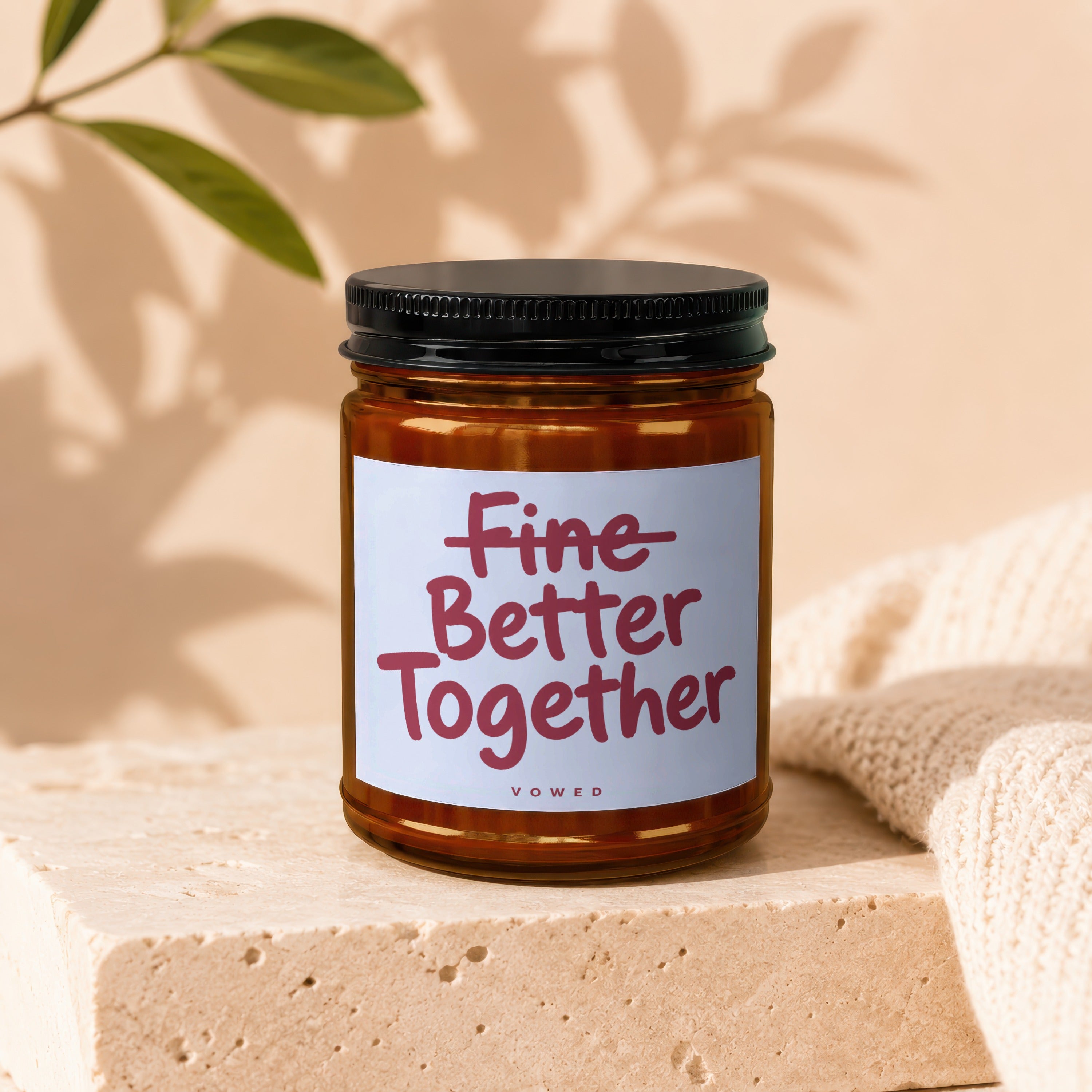 Amber jar candle with "Fine Better Together" text and "vowed" logo.