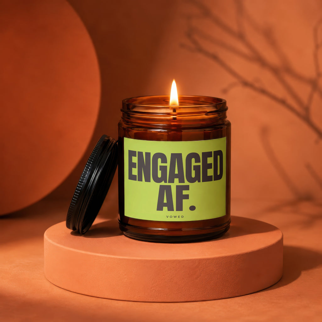 Engaged AF candle in a brown jar with a lime green label, lid ajar.