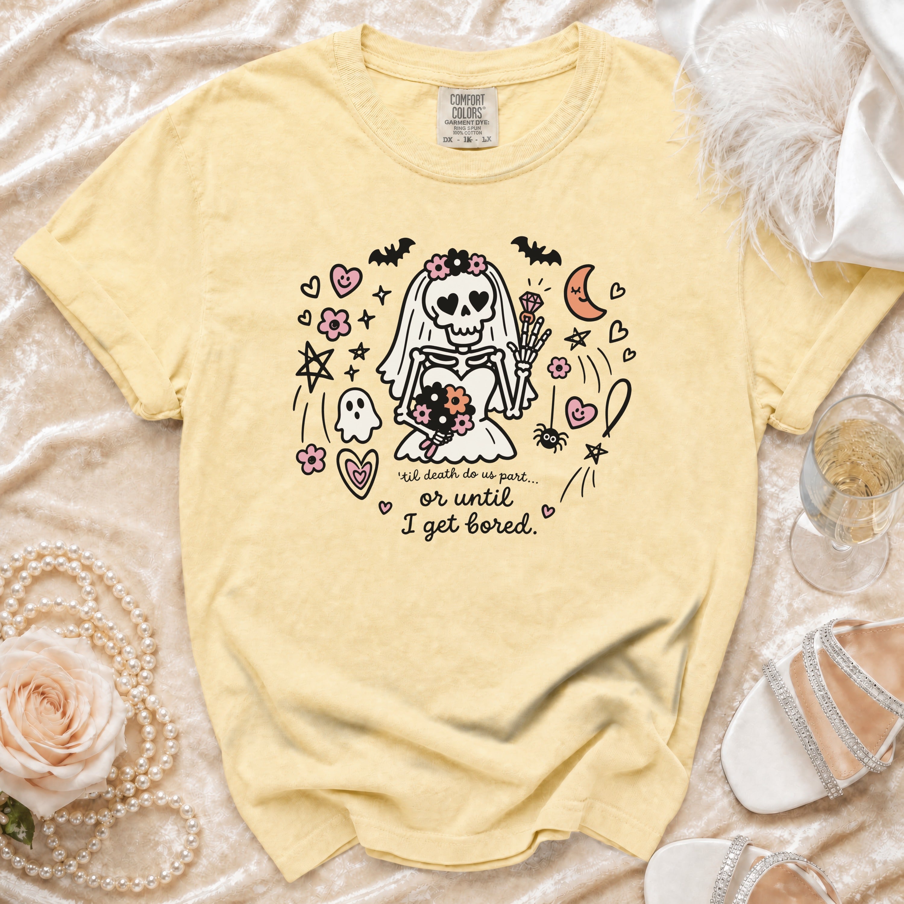 Yellow t-shirt with skeleton bride graphic and text " 'til death do us part... or until I get bored."