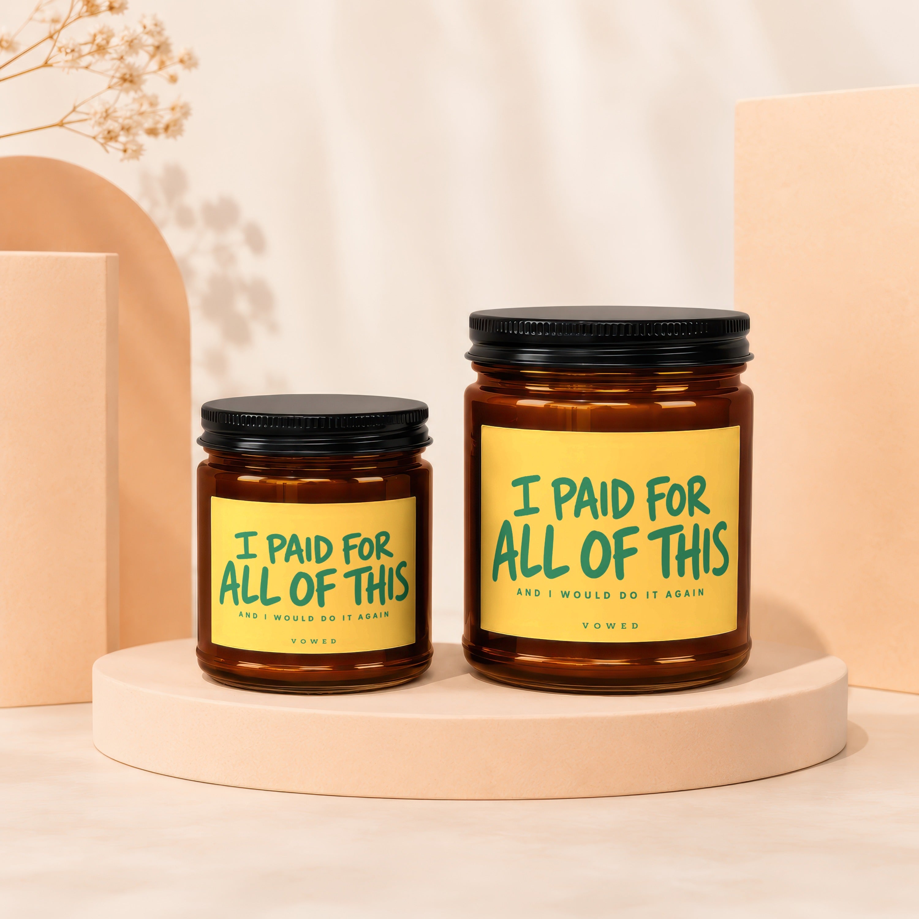Two brown glass jars with black lids, featuring yellow labels with green text.