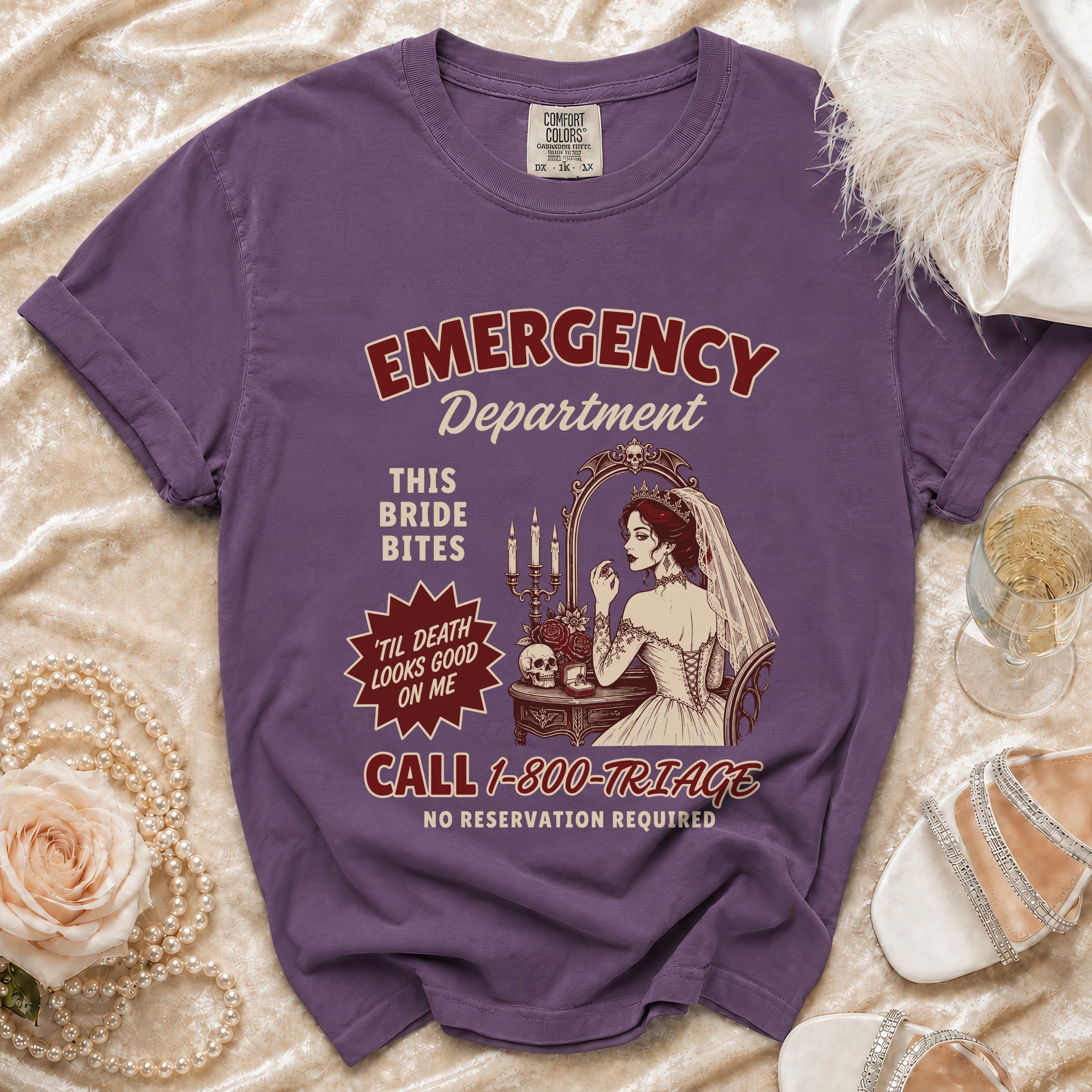 Purple t-shirt with "Emergency Department This Bride Bites 'Til Death Looks Good On Me" graphic.