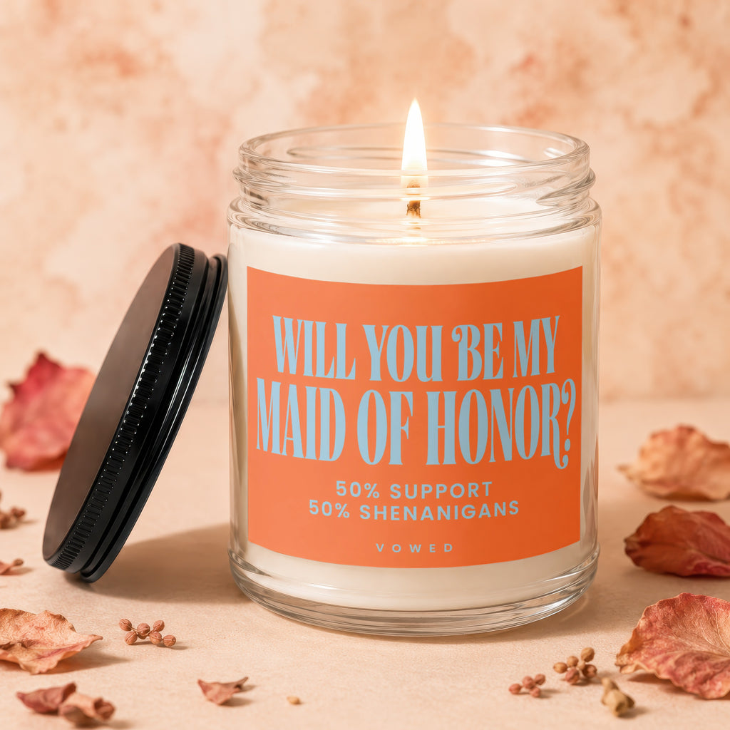 Glass candle with "WILL YOU BE MY MAID OF HONOR?" text and "50% SUPPORT 50% SHENANIGANS"
