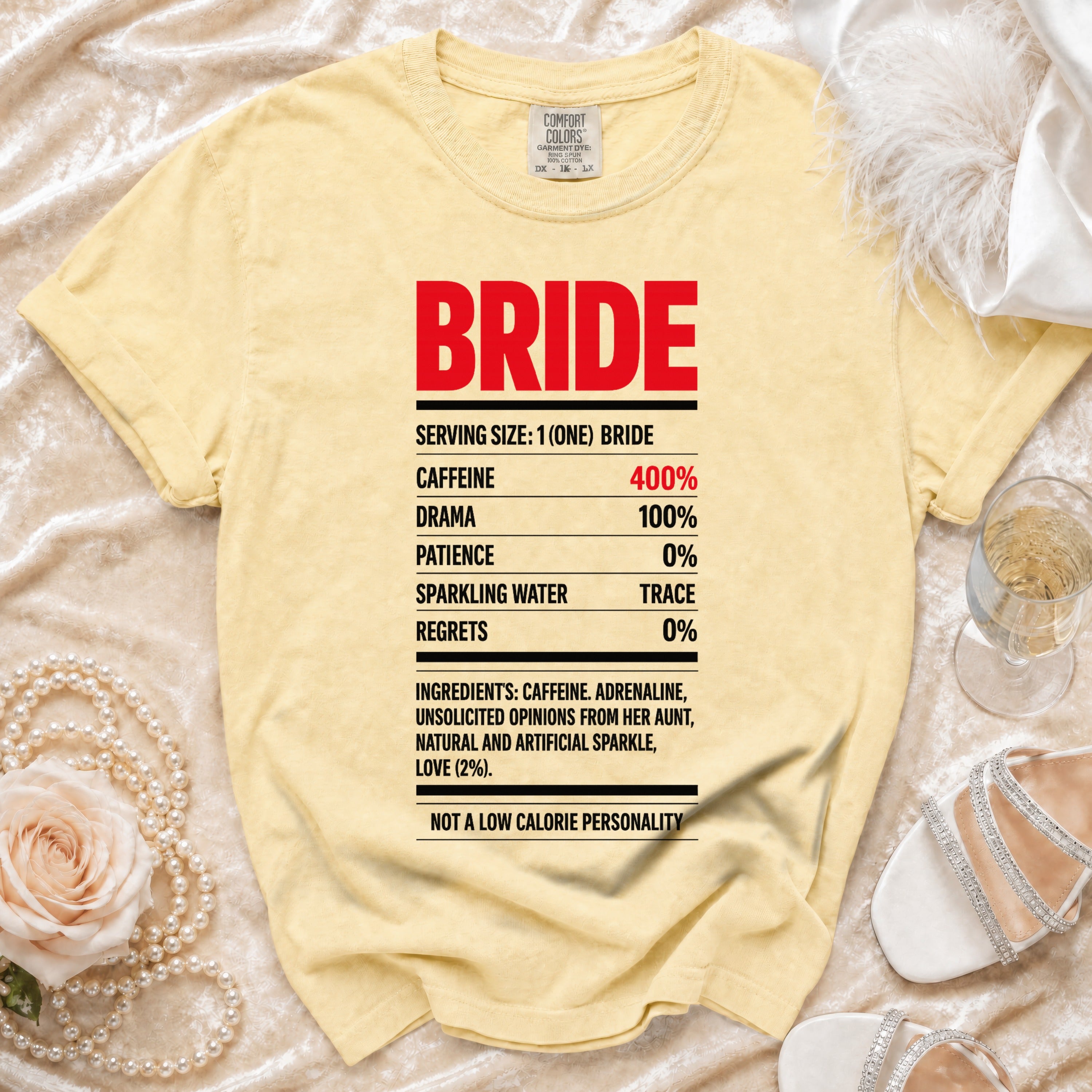 Yellow t-shirt with "BRIDE" and nutritional facts about caffeine, drama, patience, and regrets.