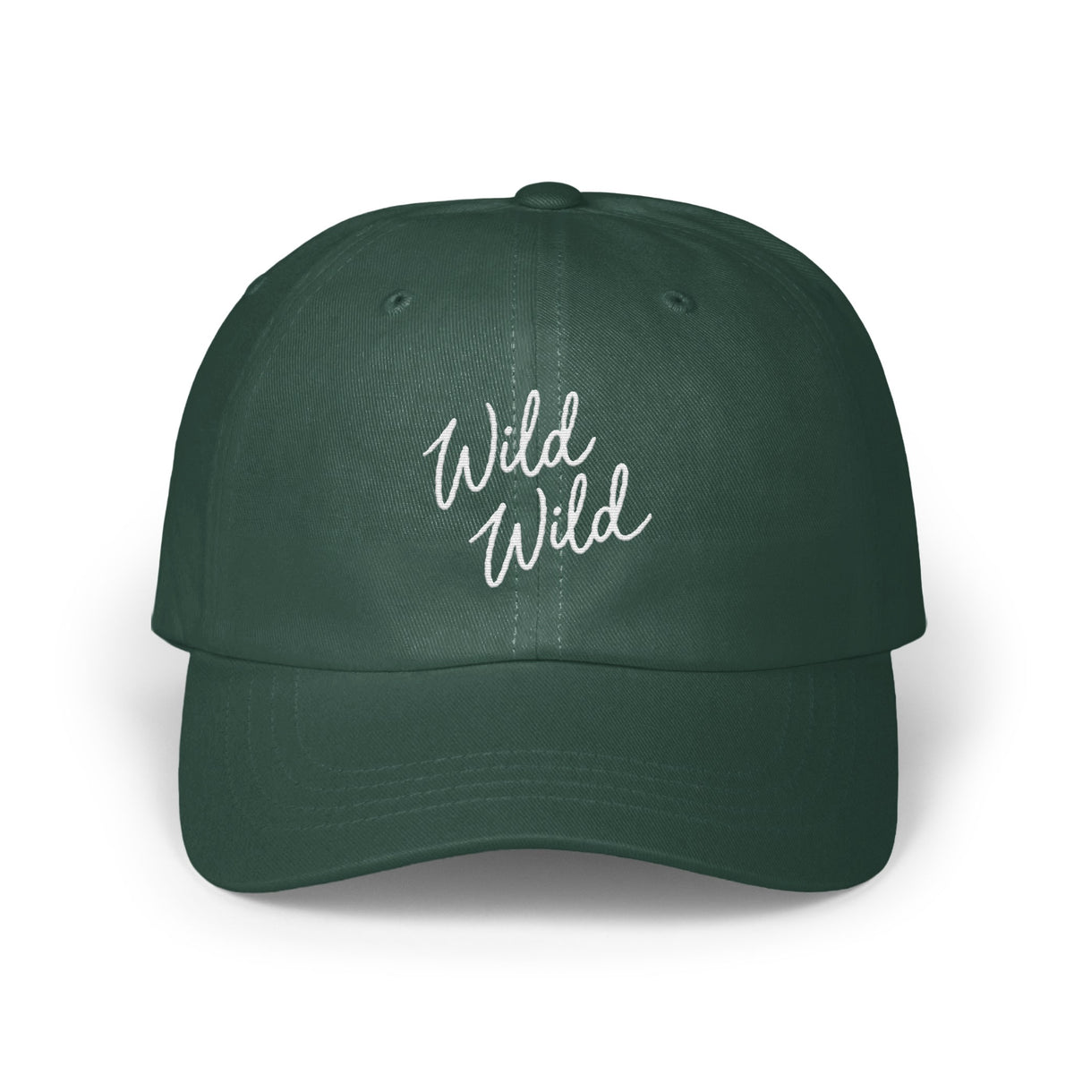 Dark green dad hat featuring white cursive text reading "Wild Wild" centered on the front panels.