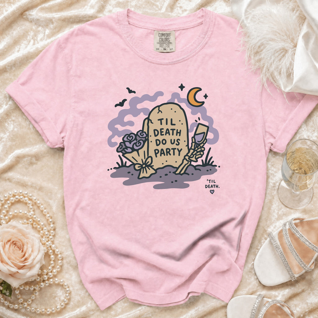 Pink t-shirt with tombstone graphic reading "Til Death Do Us Party".