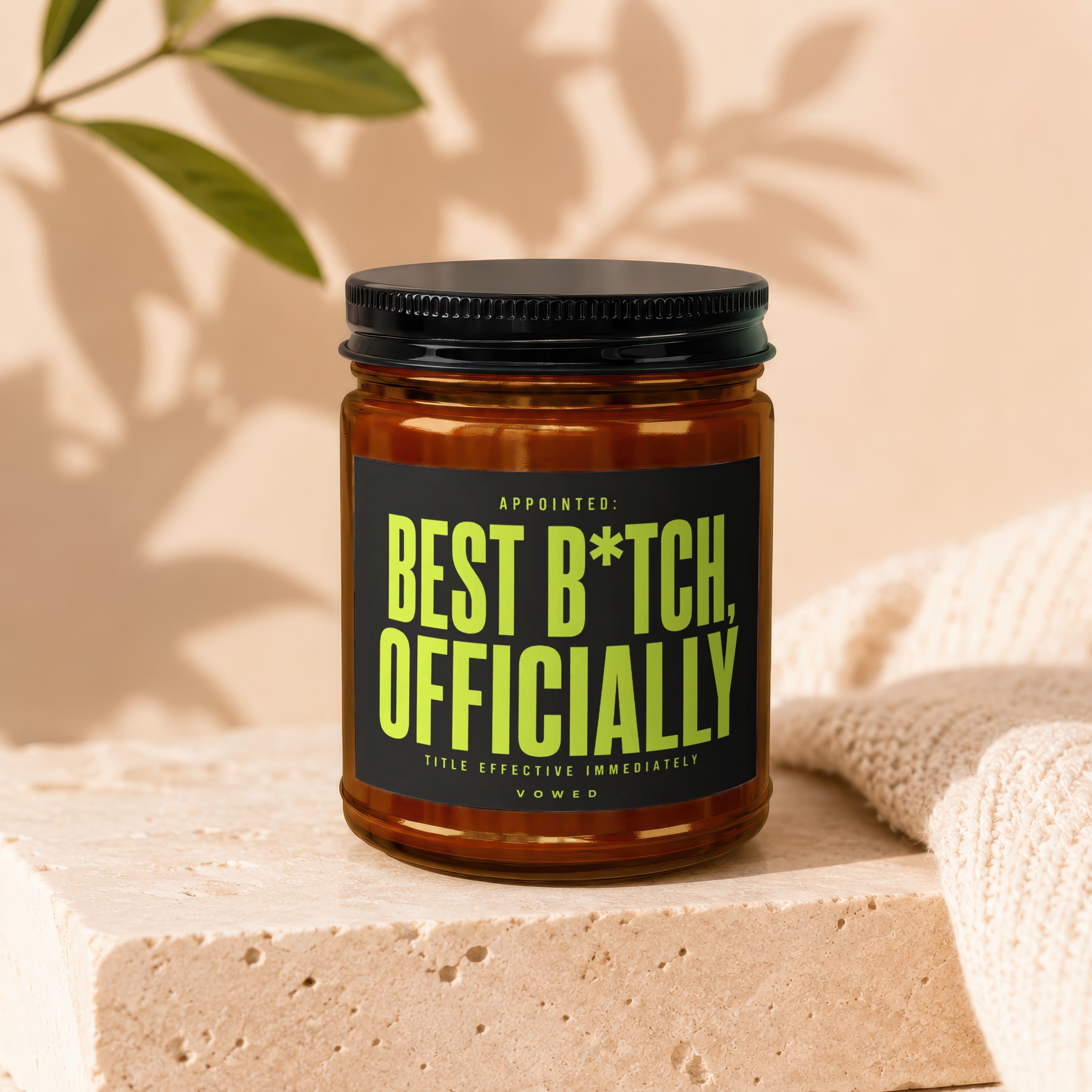 Amber jar candle with black lid and "Best B*tch Officially Vowed" text.
