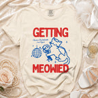 Cream t-shirt with "GETTING MEOWIED" text, cat, disco ball, and bachelorette details.