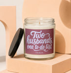 Jar candle with pink label that reads "Two husbands, one to-do list" and "VOWED".