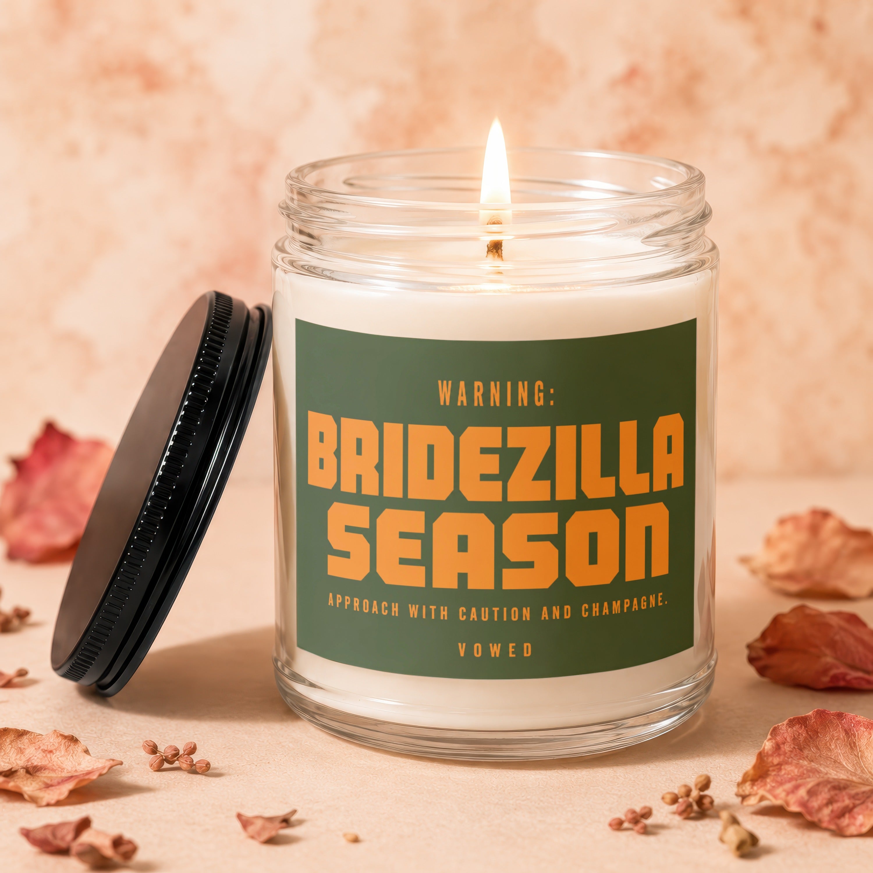 Scented candle with "Bridezilla Season" warning and champagne text.