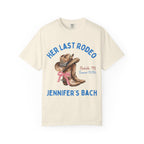 Cream t-shirt with cowboy boots, hat, "Her Last Rodeo" text, and "Jennifer's Bach"