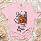 Pink t-shirt with graphic of a Negroni drink and the text "This Bride Needs a Negroni".