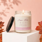 Glass jar candle with "Harper + Miles" and engagement message.