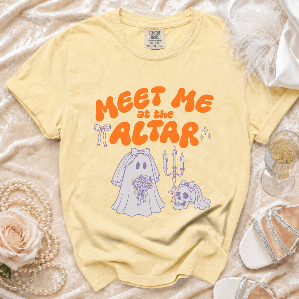 Yellow t-shirt with "Meet me at the altar" graphic featuring ghosts and skulls.