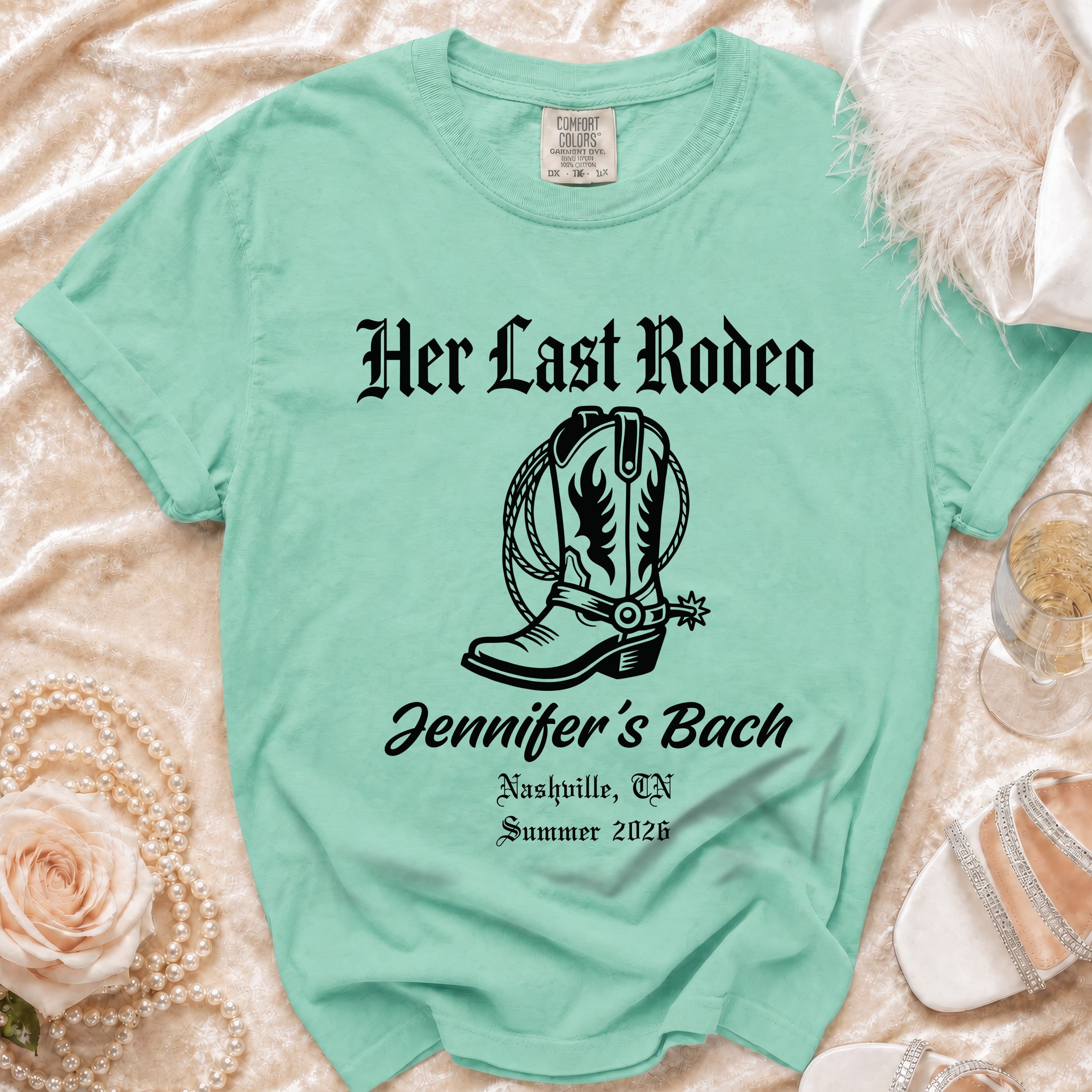 Mint t-shirt with "Her Last Rodeo" and cowboy boot graphic, "Jennifer's Bach" text.