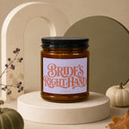 Candle labeled "Bride's Right Hand" with "Vowed" below, on display stand.