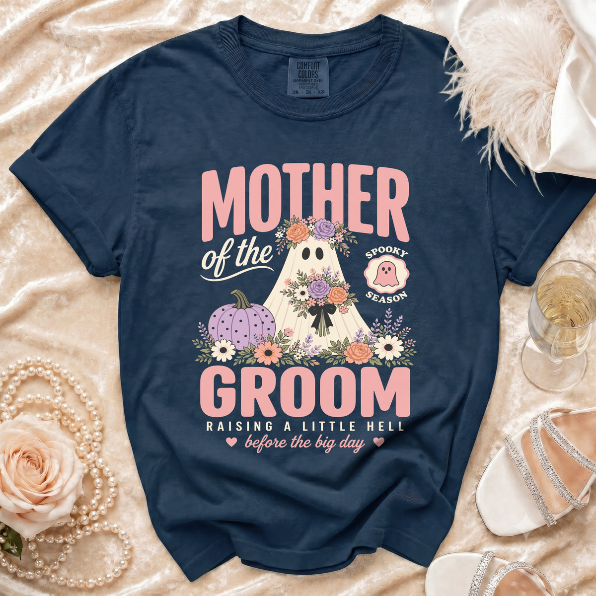 Navy t-shirt with "Mother of the Groom" text and spooky ghost graphic.