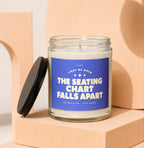 Glass jar candle with blue label reading "Light me when the seating chart falls apart."