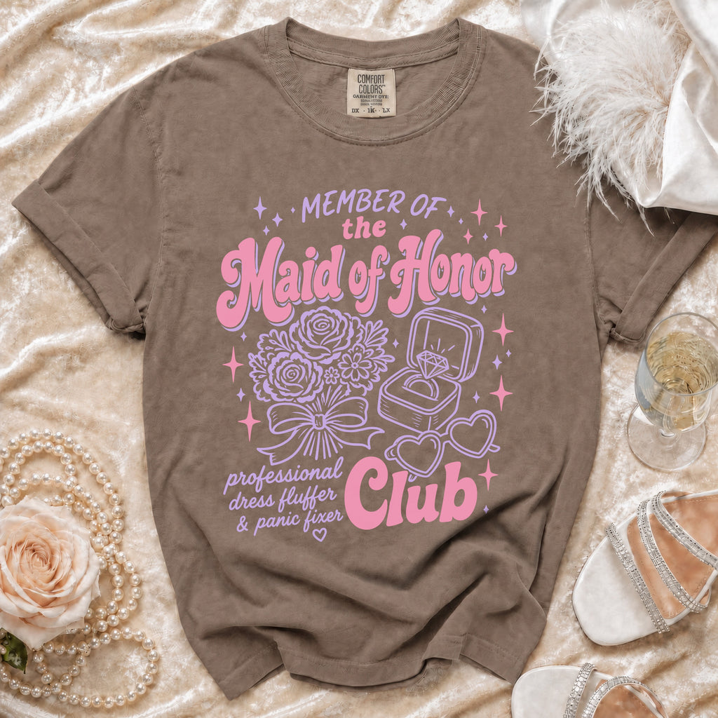 Brown Comfort Colors t-shirt with "Member of the Maid of Honor Club" graphic.