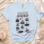Light blue t-shirt with "BRIDE On the Loose!" graphic map and wedding details.