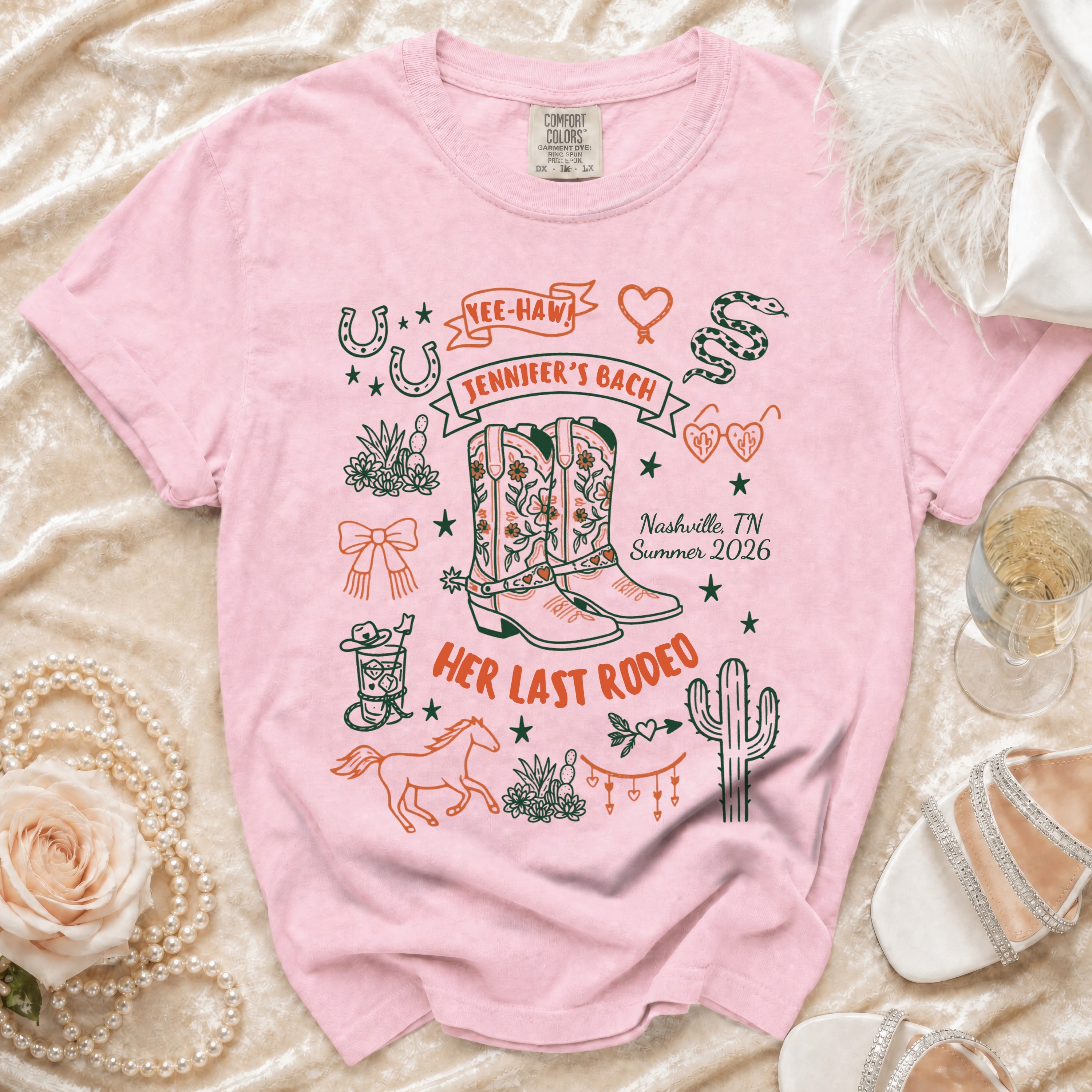 Pink t-shirt with "Jennifer's Bach Her Last Rodeo Nashville, TN Summer 2026" and Western graphics.