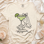 T-shirt with margarita graphic and text "This Girl Needs a Margarita".