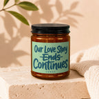 Brown glass candle with a light green label reading "Our Love Story Ends Continues VOWED".