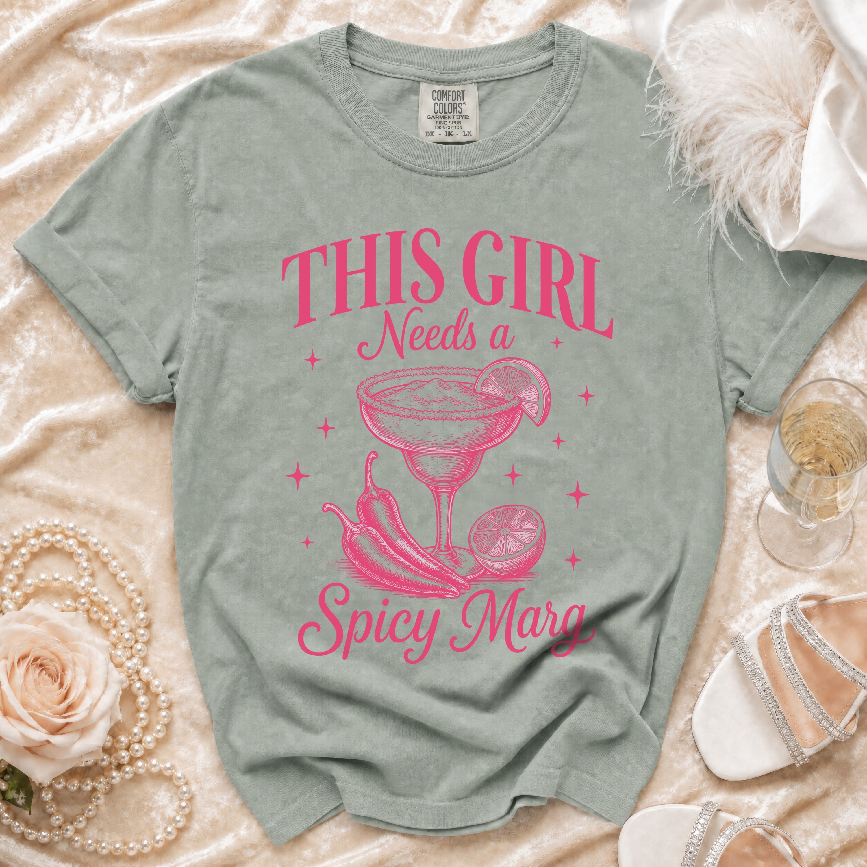 T-shirt with "This Girl Needs a Spicy Margarita" text and graphic.