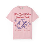 Pink t-shirt with "Her Last Rodeo Jennifer's Back" and cowboy hat graphic.
