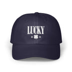 Dark blue baseball cap embroidered with the white text "LUCKY" and a four-leaf clover.