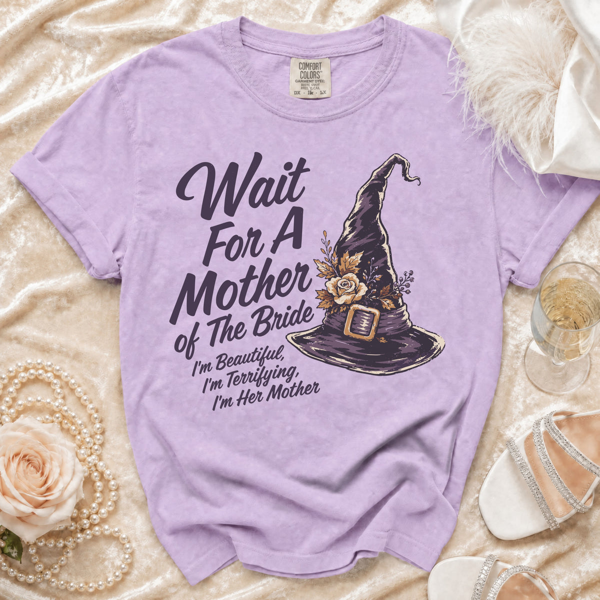 Lavender t-shirt with witch hat graphic reading "Wait For A Mother of The Bride".