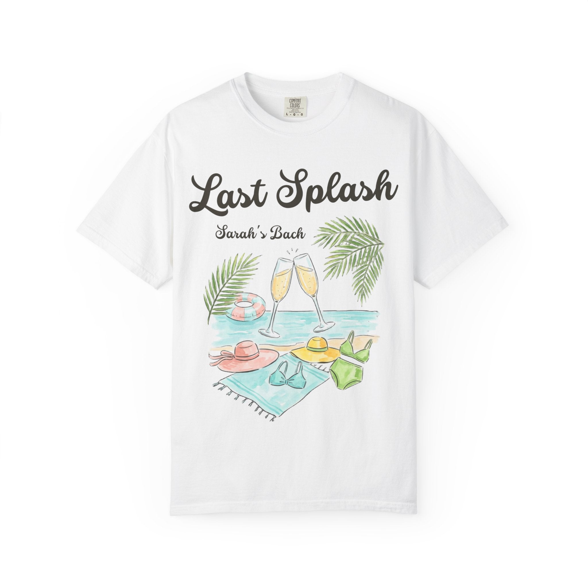 White t-shirt with "Last Splash Sarah's Bach" text and beach accessories illustration.