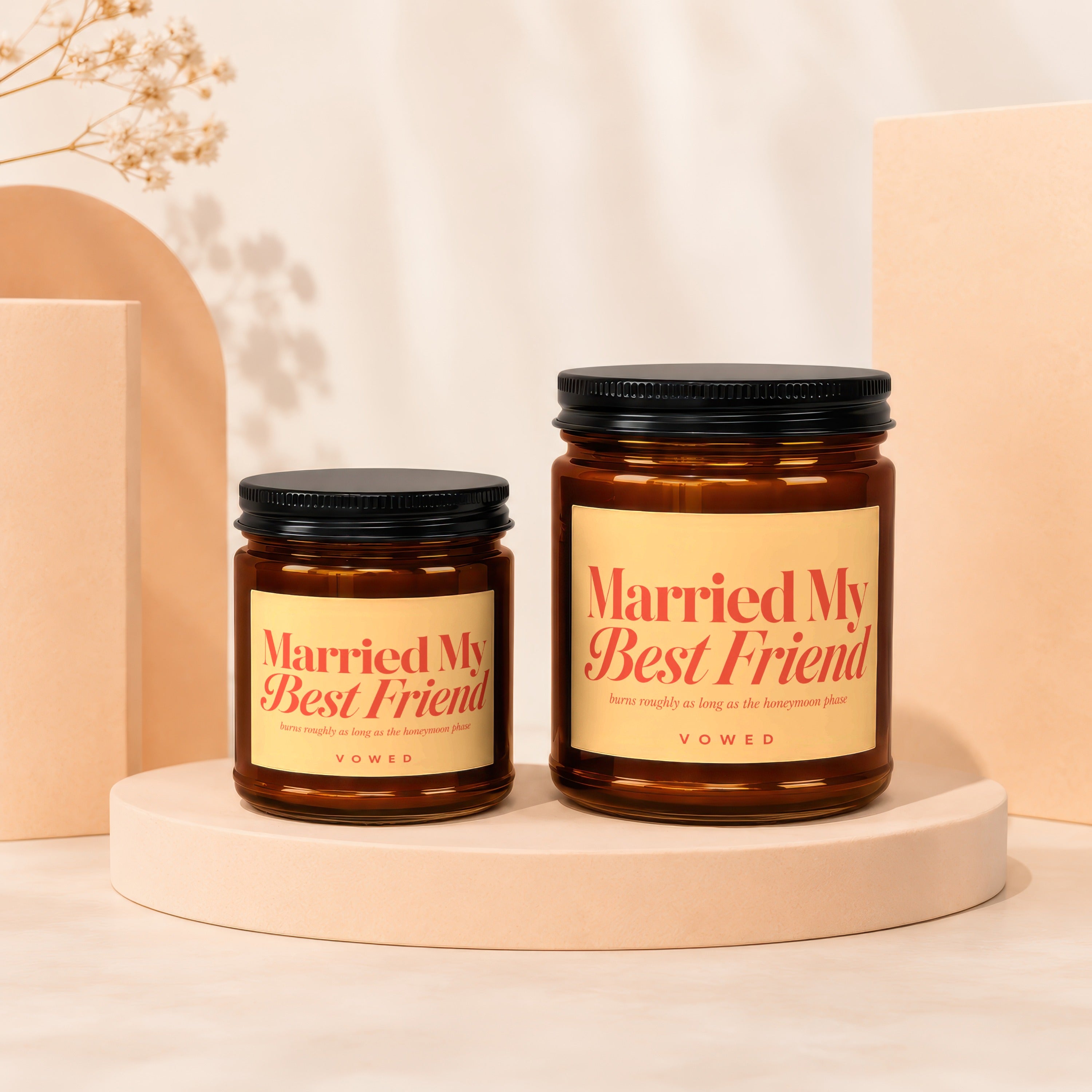 Two amber jars with black lids, featuring labels that say "Married My Best Friend".