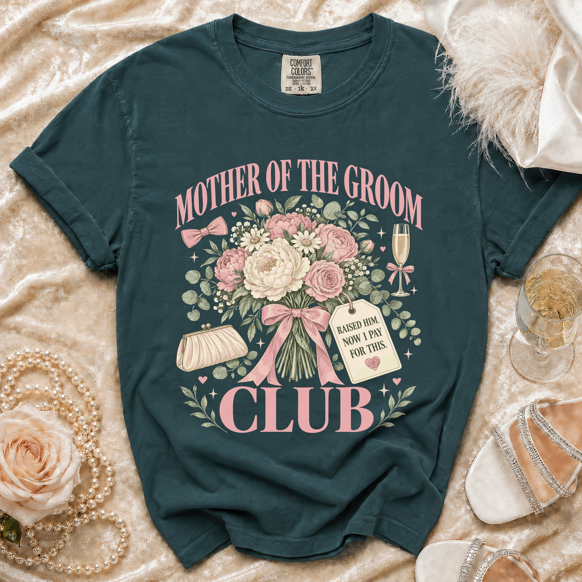 Teal t-shirt with "Mother of the Groom Club" text and floral design.