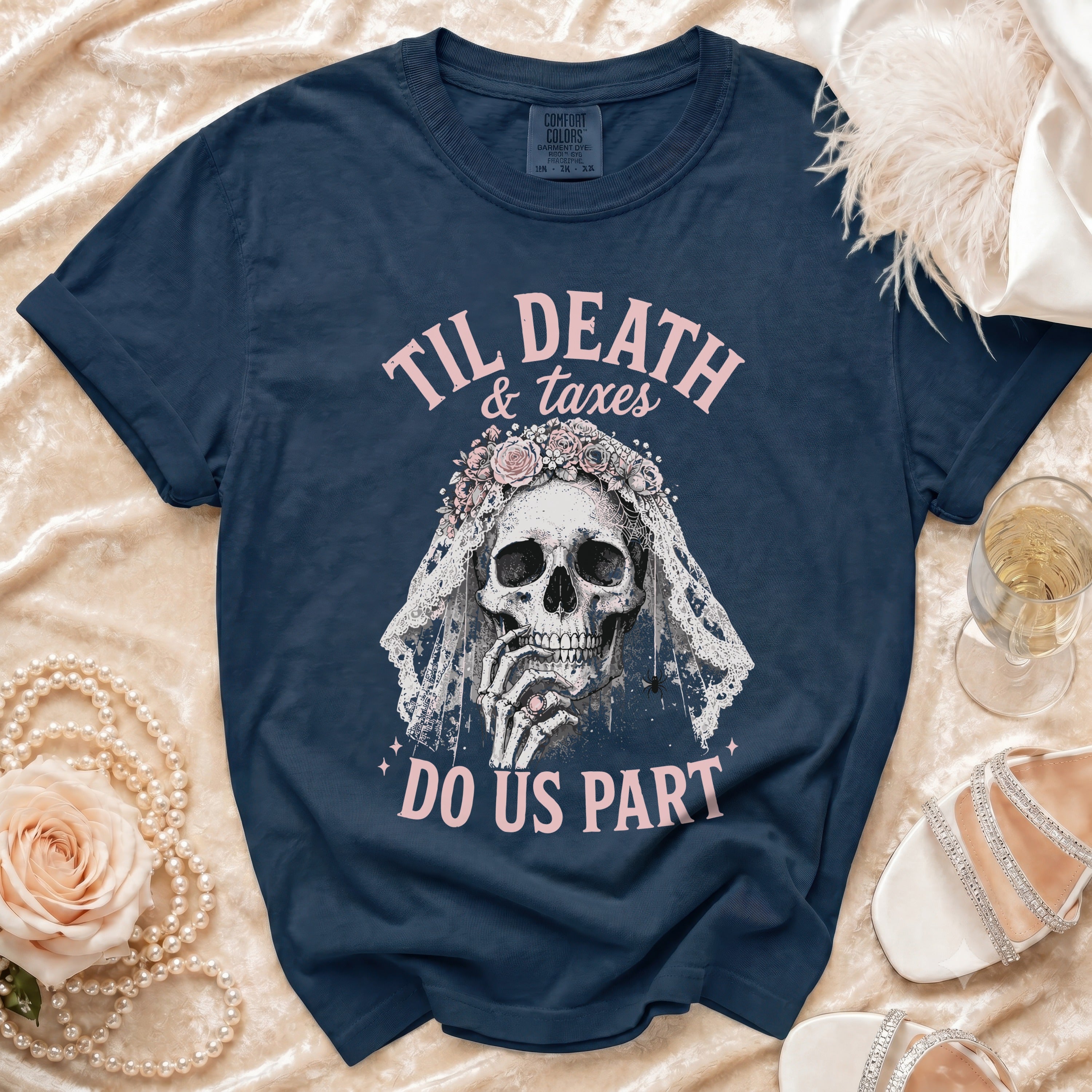 Navy t-shirt with skeleton bride graphic and text "Til Death & Taxes Do Us Part".