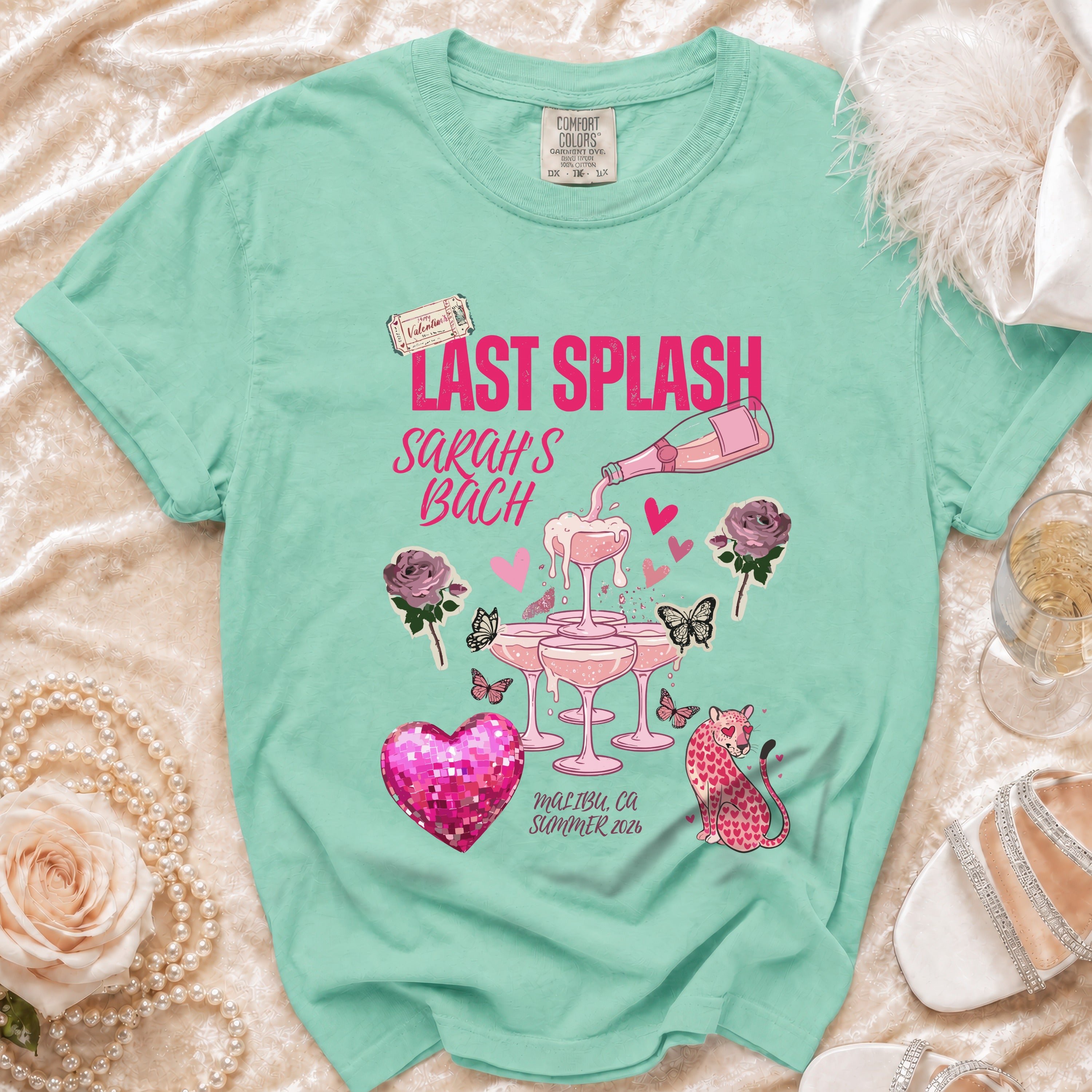Mint t-shirt with "Last Splash Sarah's Bach" text, pink heart, and leopard.