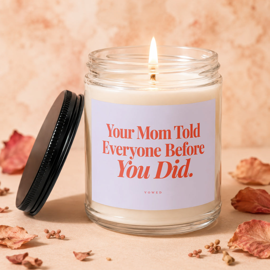 Candle with text "Your Mom Told Everyone Before You Did." and brand "VOWED".